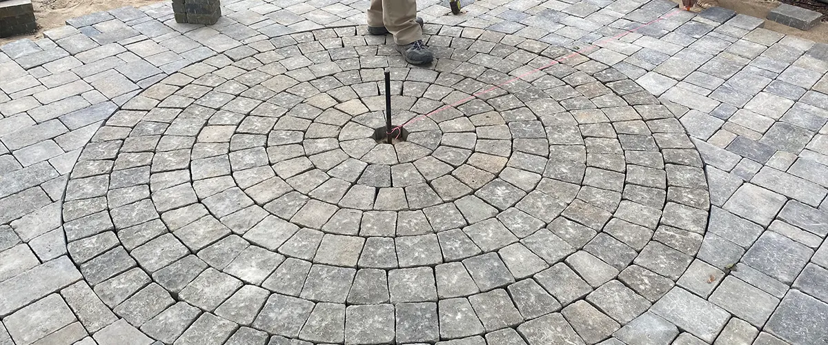 A circular patio with an empty place in the center