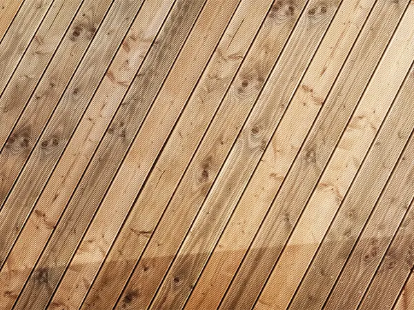 Composite decking resembling the natural wood grain