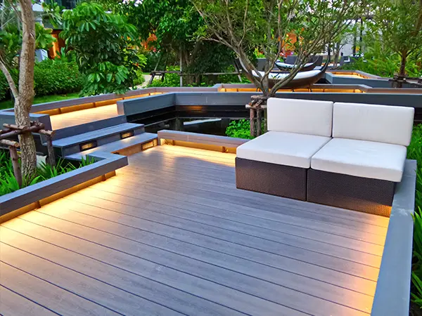 Deck lighting with a white bench