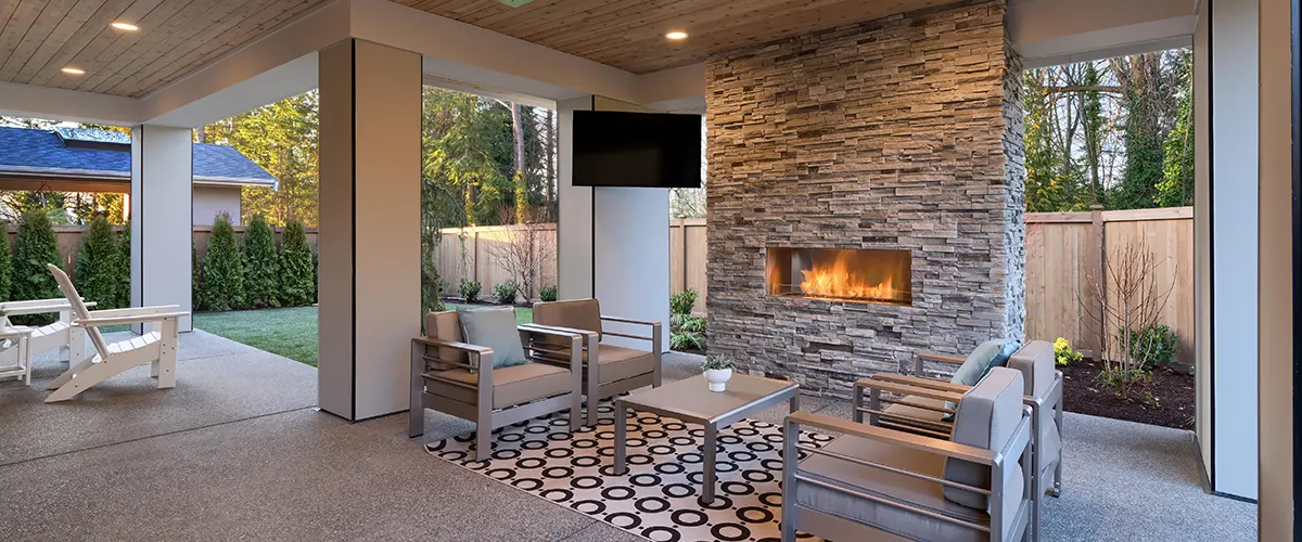 modern outdoor space with stone fire place