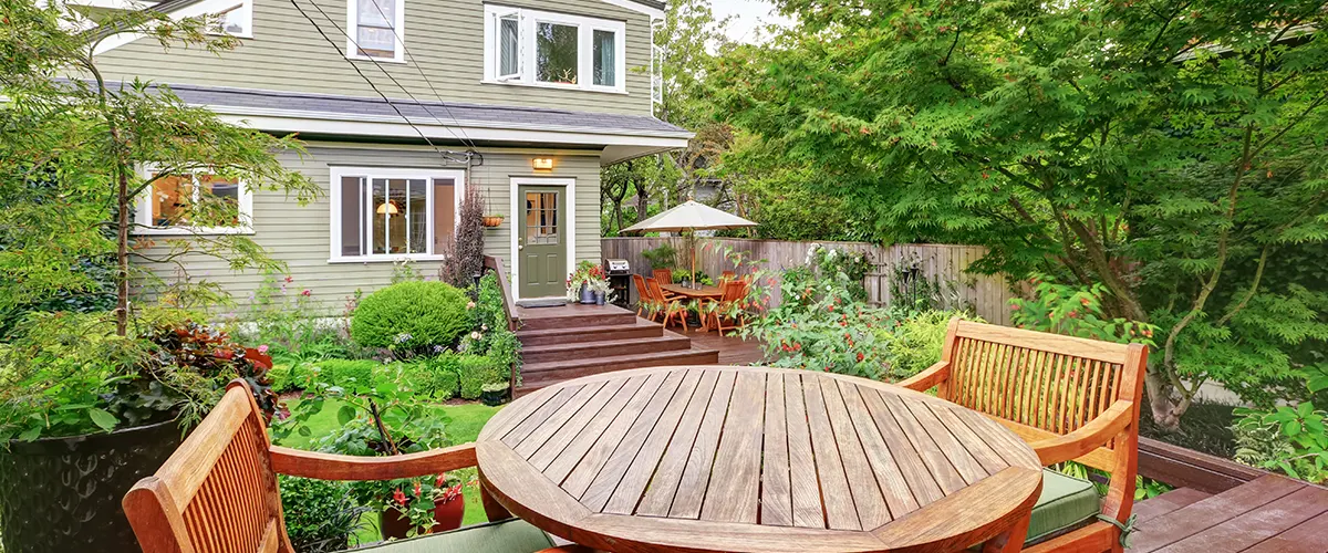 outdoor living space with wood deck and furniture