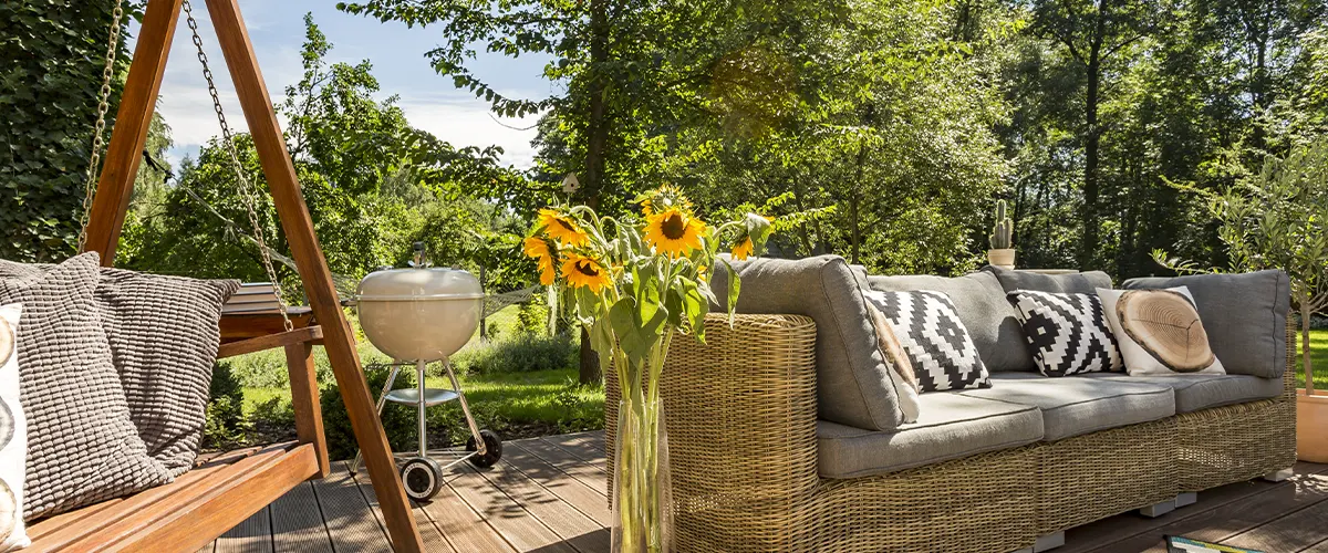 outdoor patio with sofas and grill