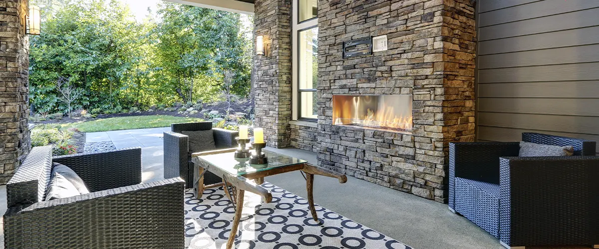 outdoor patio with stone fire place