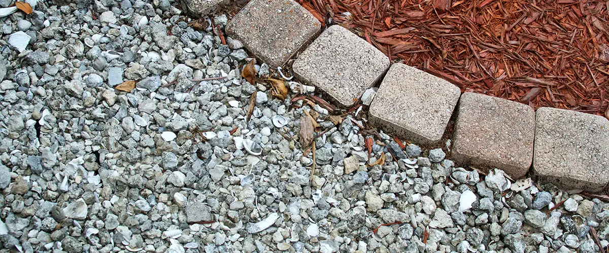 Crushed gravel and small pavers as part of a xeriscaping project in Denver