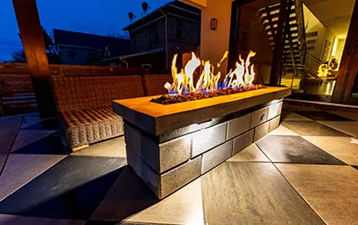 paver patio fire feature installed by Colton