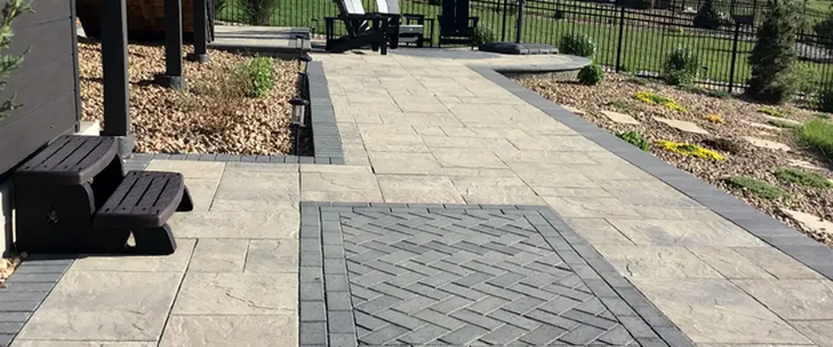 hardscaping lakewood co landscaping hardscaping modern outdoor patio with gray stone pavers herringbone pattern mountain backdrop