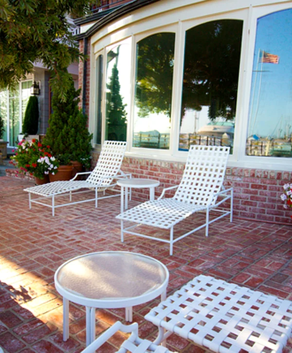 outdoor living space centennial co professional outdoor living space with brick patio white lattice furniture potted plants