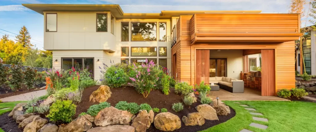 a modern house featuring contemporary architectural design and professional landscaping