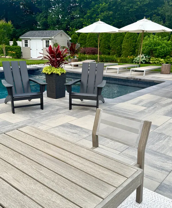 Wide-angle view of a completed paver patio installation in Dakota Ridge, CO, highlighting craftsmanship and layout.